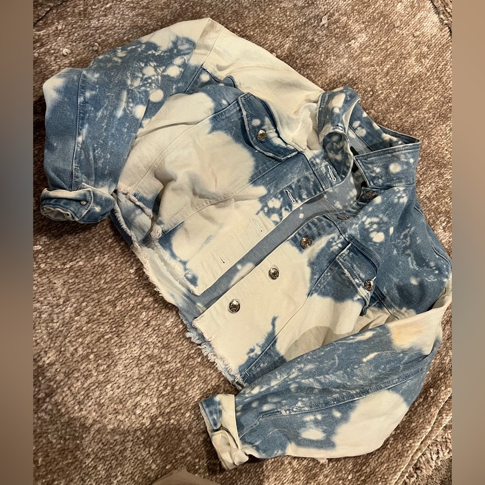 Bleached oversized denim jacket. It’s also cropped. Size medium